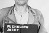 Josef Fuchsloch en kamp Harzungen Haftbogenfoto van Josef Fuchsloch, SS-Oberscharführer en plaatsvervangend Lagerführer van buitenkamp Harzungen.