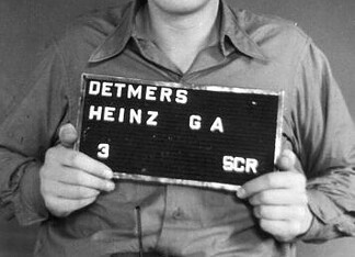 Heinrich Detmers: adjudant van Dachau en Mittelbau Registratiefoto van Heinrich Georg Alfred Detmers, SS-Obersturmführer en beklaagde tijdens de Dachauer processen.